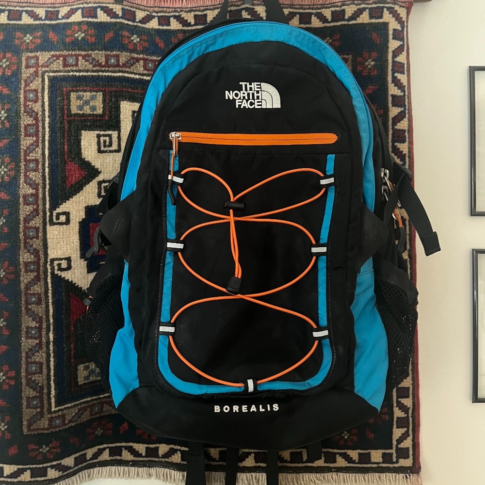 The North Face Borealis Backpack black, blue, and orange